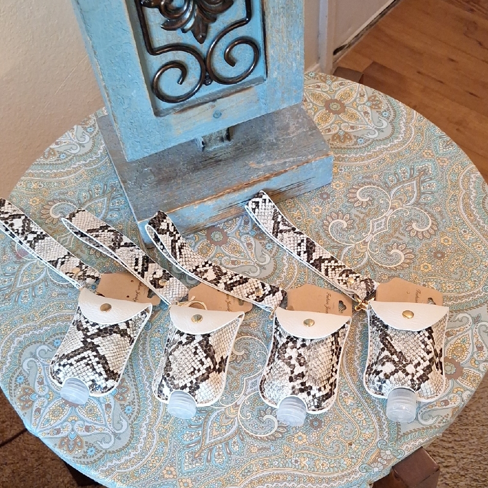 🔥🔥 HOT DEAL Key Chain Arm Wrislet Snake Print Hand Sanitizer Holders.